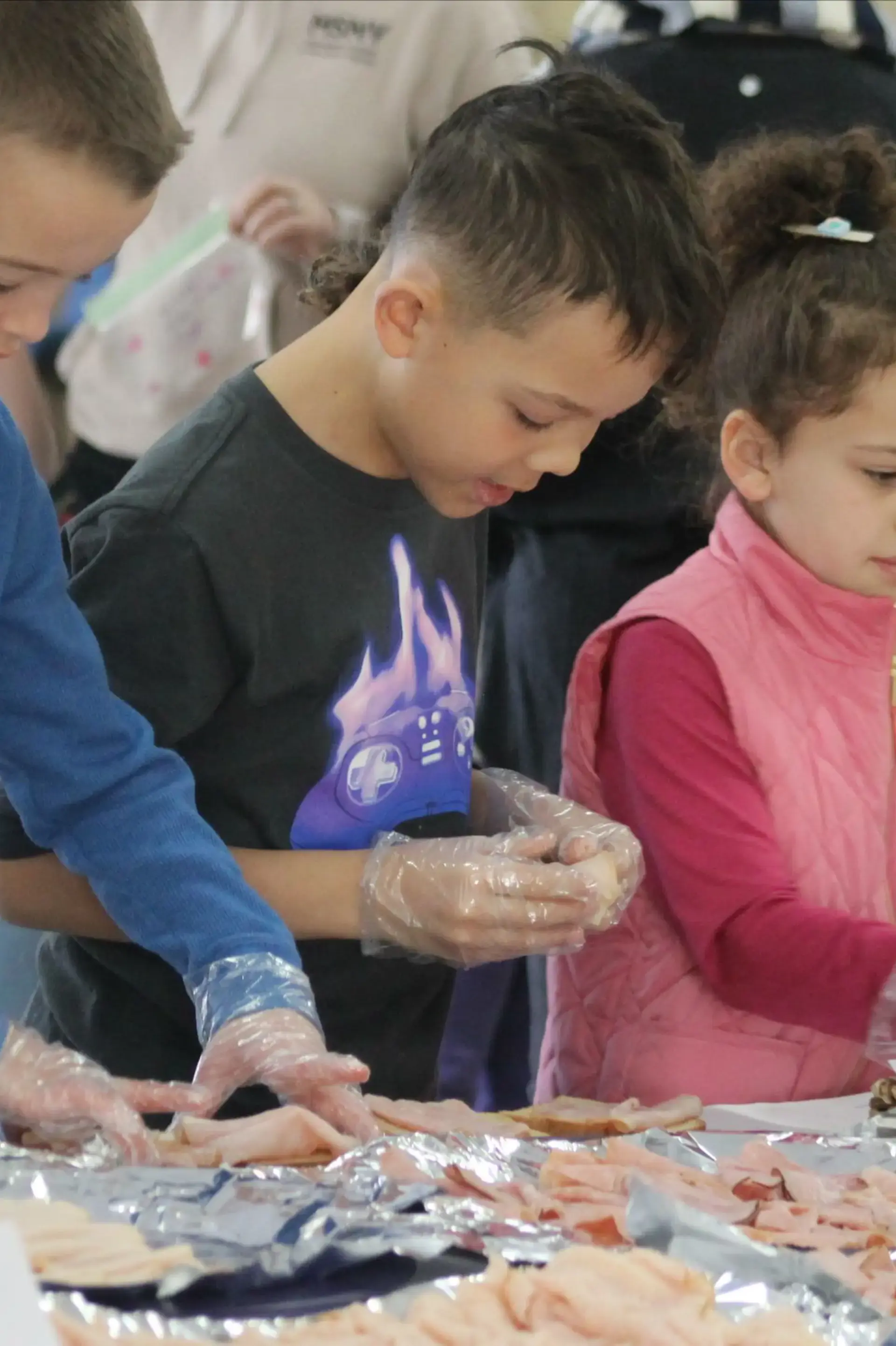 Students making sandwiches as part of community service initiative